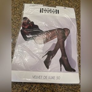NWT. Wolford tights size M.